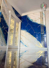 Luxury Venetian Stucco wall with high-gloss blue and gold accents