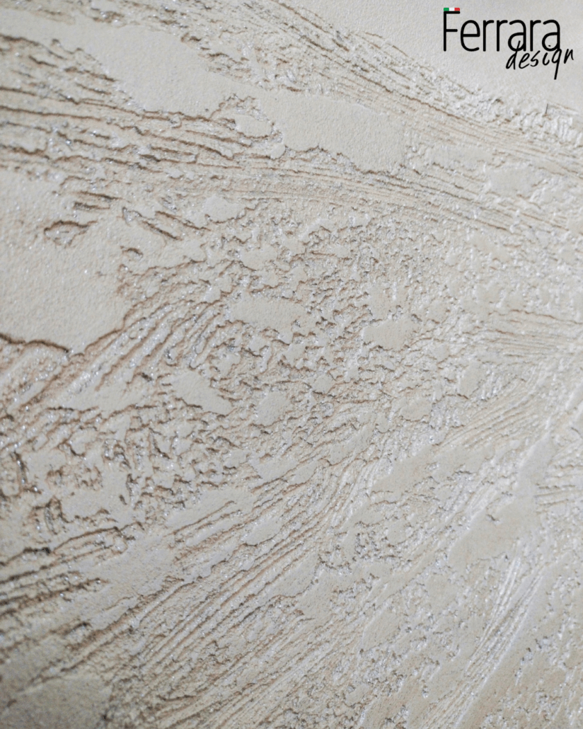 Textured beige surface with 'Ferrara design' branding