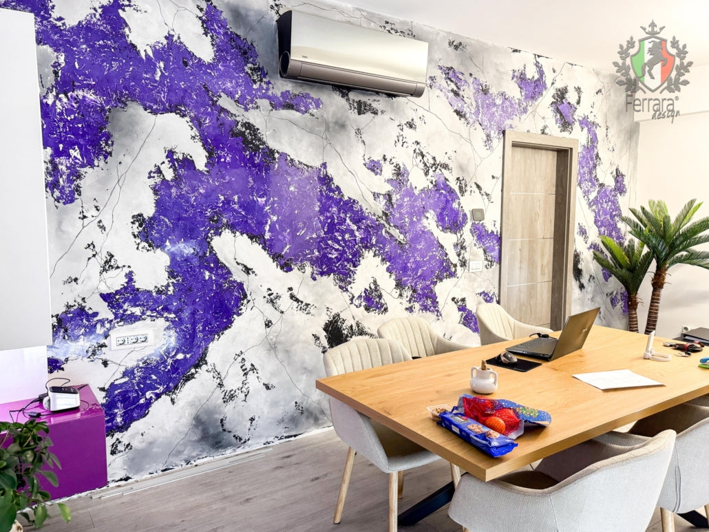 Modern office interior with a large abstract mural on the wall, featuring purple and white colors.