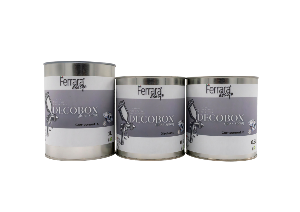 Three cans of Ferrara Decobox on a white background