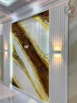 Venetian stucco wall with high-gloss finish and gold accents