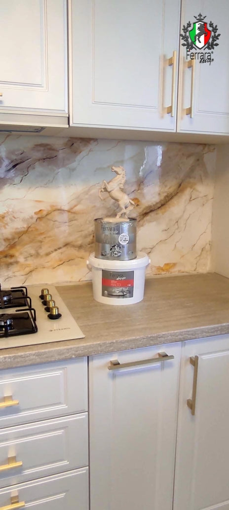 Kitchen counter with a container and stove, marble backsplash, and Italian brand logo.
