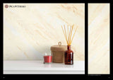 Venetian marble effect plaster wall with decorative vases and candles