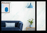 Wall with Venetian marble effect plaster and blue pendant light